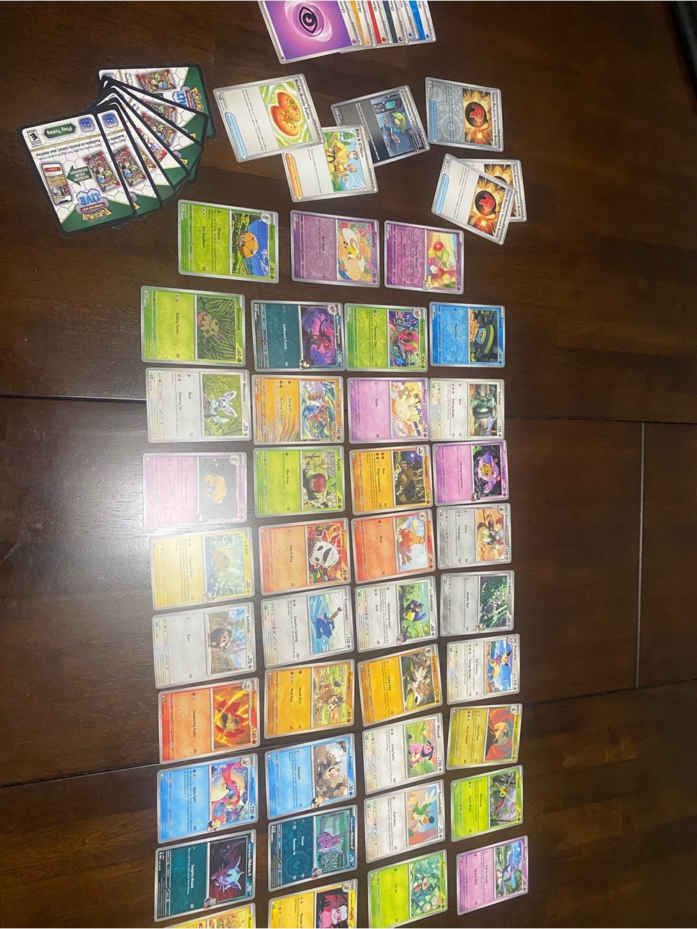 Assorted Pokémon Trading Cards includes shiny, trainers, energies & mobile codes